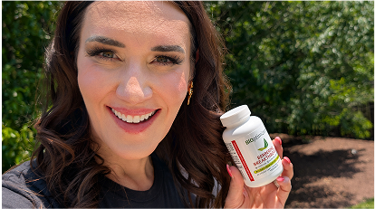Elizabeth Skordinski holding a BIOptimizers product