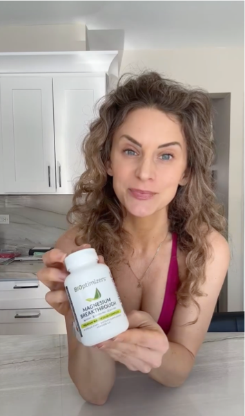 Woman with magnesium supplement