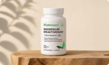 Magnesium Breakthrough bottle on a wood block