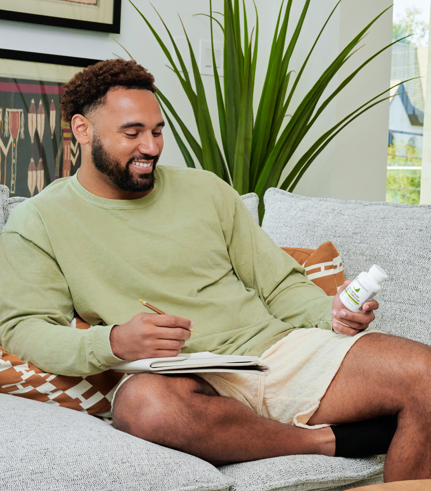 Man with MassZymes bottle