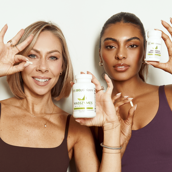 Woman with MassZymes bottle